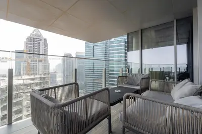 a balcony with a view of a city at Balcony with City View 2 Bedroom - JLT Dubai Close to Metro & Marina by Heaven Crest Vacation Homes in Dubai