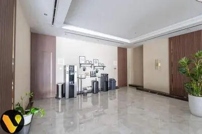 a lobby with a row of trash cans at Vogue Sports City Hera Tower Near First Avenue Mall, Studio Apartment with Balcony, Canal and City View, Access to all Amenities in Dubai