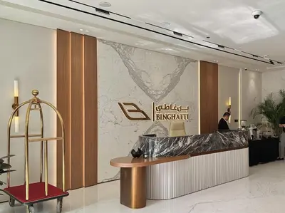 a lobby of a restaurant with a counter in front of it at Elegant and Stylish Retreat - Lavender Binghatti 1103 in Dubai