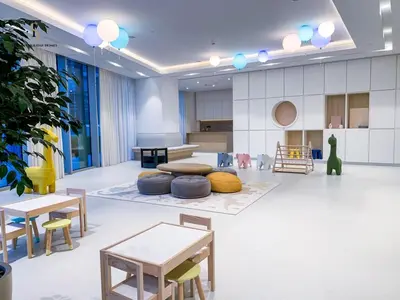 a large room with tables and chairs in a room at Dream Apartment with Burj Khalifa & Fountain Views in Dubai