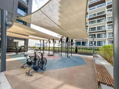 a group of bikes parked under a building at Central Modern Studio with Floor to Ceiling Windows in Dubai
