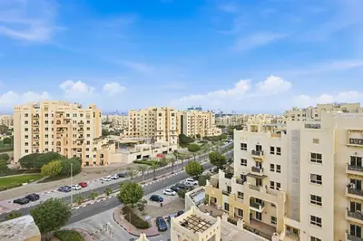 an aerial view of a city with tall buildings at Bloomfields Homey 1BR in Al Ramth 37 in Dubai
