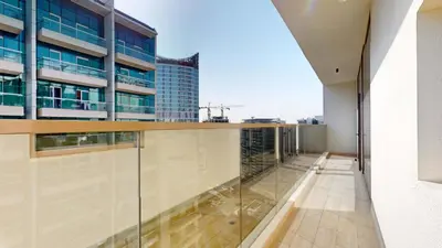 a view from the balcony of a building at Elegant 2BR Canal & Burj Khalifa View 1 in Dubai