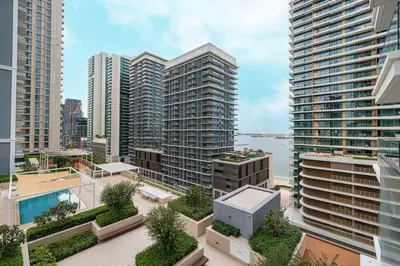 an aerial view of a city with tall buildings at Beachfront 2BR Marina & Beach Views in Dubai