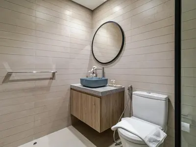a bathroom with a sink and a mirror at Stunning High-Floor 1BR Burj Khalifa & Canal Views in Dubai