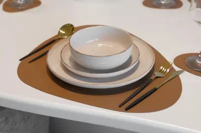 a plate with a cup and a bowl on a tray at New, Bright & Modern 4BR Villa in Tilal Al Furjan in Dubai