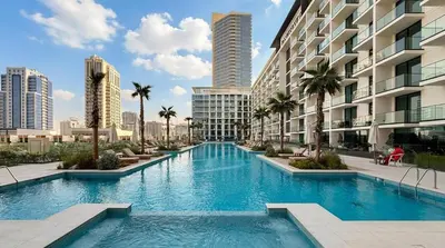 a large swimming pool with palm trees and buildings at Binghatti Phoenix! Longest Pool in Dubai! Brand New Building, 2 Double Beds! in Dubai