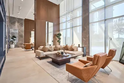 a living room with couches and a table at STAY BY LATINEM Luxury 1BR Holiday Home CVG2403 Near Downtown in Dubai