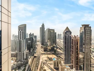 a view of a city with tall buildings at Luxury 2BR - Paramount Midtown with Infinity Pool in Dubai