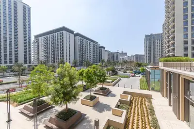 an aerial view of a city with tall buildings at StayShort - Modern Dubai Hills Apartment Great Pool Sleeps 4 in Dubai