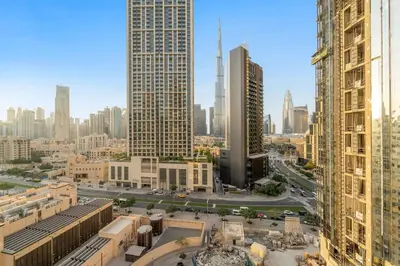 a view of a city with tall buildings at FIRST CLASS 2BR Burj View , Walk to Dubai Mall in Dubai