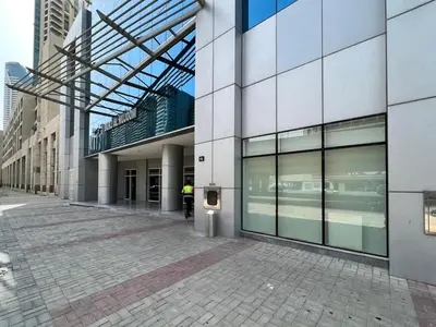 an empty street in front of a building at FIRST CLASS 2BR Burj View , Walk to Dubai Mall in Dubai