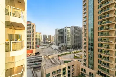 an aerial view of a city with tall buildings at FIRST CLASS 2BR Burj View , Walk to Dubai Mall in Dubai