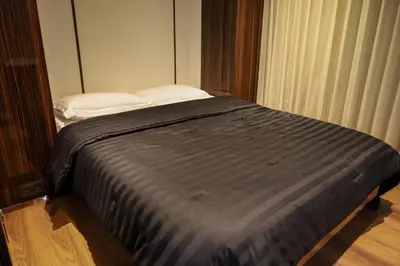 a bed in a small room with a bed sidx sidx sidx at Luxury Yacht in Dubai Marina - Private Charter in Dubai