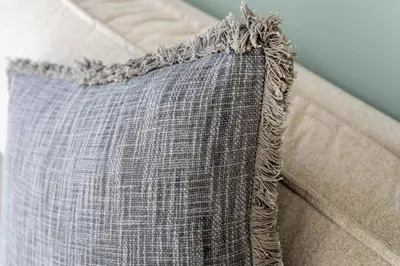 a pillow sitting on top of a couch at Perfect Getaway in Downtown l Near Dubai Mall in Dubai
