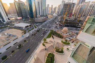 an aerial view of a busy city street with traffic at Downtown Dubai - Near Burj Khalifa & DWTC-Gulfood - Imperial Avenue in Dubai