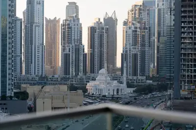 a view of a city skyline with a building at Downtown Dubai - Near Burj Khalifa & DWTC-Gulfood - Imperial Avenue in Dubai