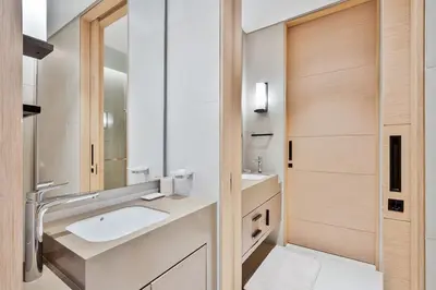 a bathroom with a sink and a mirror at Elegant 3 bed Haven in Address JBR Tower 1 in Dubai
