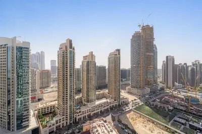 an aerial view of a city with tall buildings at Silkhaus Luxurious 1BR with Balcony Pool and Gym Downtown in Dubai