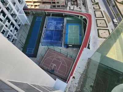 an overhead view of a tennis court on a building at Skyz by Danube, Brand new Studios in Arjan in Dubai