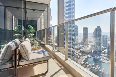 an apartment balcony with a view of the city at Frank Porter - Sparkle Tower 1 in Dubai