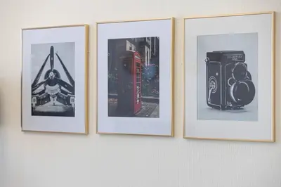 a group of four pictures hanging on a wall at New studio in Arjan ideal for long stays in Dubai