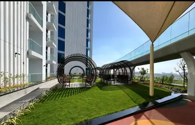 a view from the balcony of a building at Skyz by Danube Studio Apartment in Arjan , Pool, Gym & Near Miracle Garden in Dubai