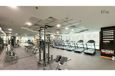 a gym with a bunch of treadmills and machines at 77 Floor Luxury 1Br Marina Sea View Balcony in Dubai