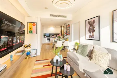 a living room with a couch and a table at Upgraded 1BR in JW Marriot with Marina View by BMS in Dubai