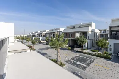 an aerial view of an apartment complex at Spacious 3BR Villa plus Maids with Resort-Style Amenities in Tilal Al Ghaf in Dubai