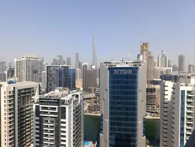 a view of a large city with tall buildings at Studio Hide Away in the Business Bay in Dubai