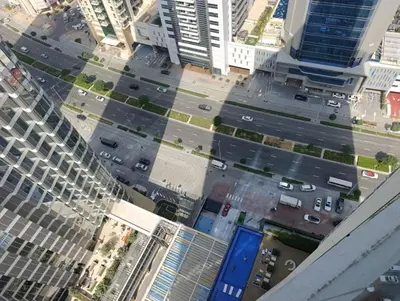 an aerial view of a city street with tall buildings at Studio Hide Away in the Business Bay in Dubai