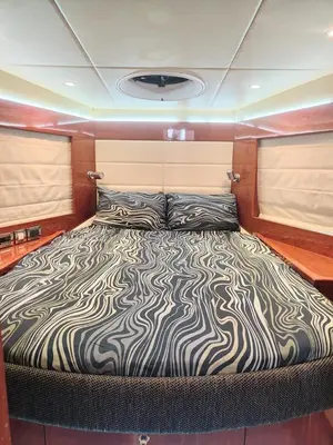 a large bed in the center of a boat at Luxury yacht Stay Dubai in Dubai