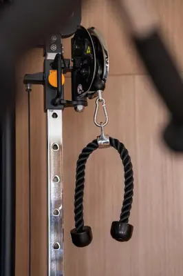 a camera is hanging on a wall at Modern Studio in Binghatti Azure with Pool & Gym in Dubai
