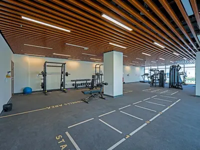 a gym with lots of equipment in a building at Spacious 1BR with Modern Living in Al Furjan-805 in Dubai