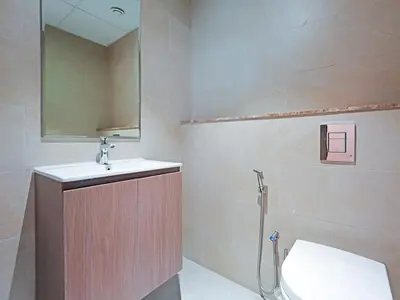 a bathroom with a sink and a toilet at Exclusive 2BR Apartment - Prime Al Furjan-707 in Dubai