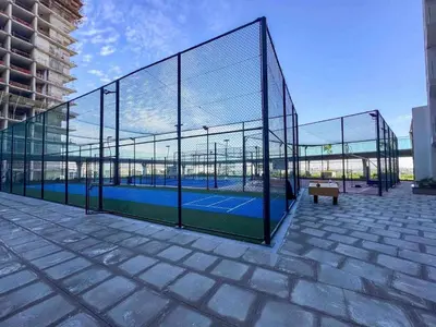 a batting cage with a tennis court in it at 25 Studio Skyz By Danube, Arjan in Dubai