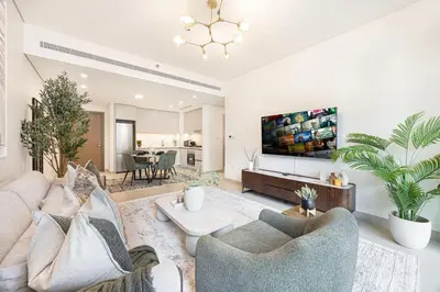 a living room with a couch and chairs at Blissful Living at Beach Mansion with Private Beach in Dubai