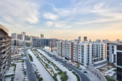 an aerial view of a city with buildings at Joya Blanca Residence - Bright 1BR Apartment in Arjan in Dubai