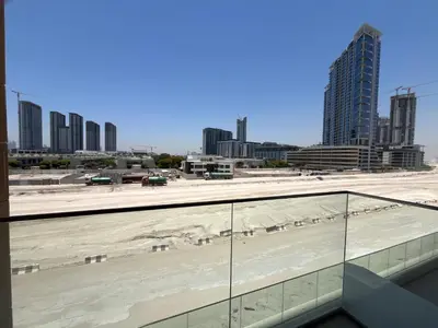 a view of a city from the roof of a building at Chic French-Riviera Vibe - Burj View 1BR in Dubai