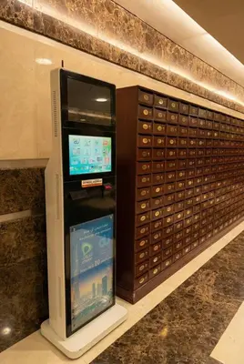 a display of a wine cellar with a tv in it at High-Floor Marina 1BR Apartment | Skyline Views in Dubai