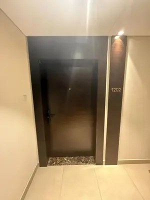 a elevator in a building with a black door at Marina bedspace Partial Sea View close to Tram in Dubai