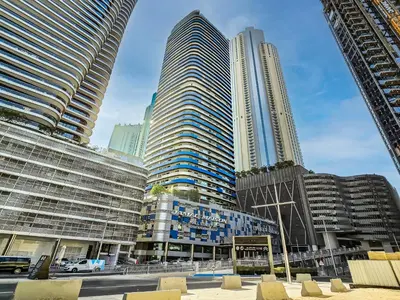 a group of tall buildings in a city at Next to Dubai Mall & Burj Khalifa I Luxury Design in Dubai