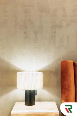 a white lamp sitting on a wooden table at 4 Bedroom Burj View Apartment In Downtown Dubai in Dubai