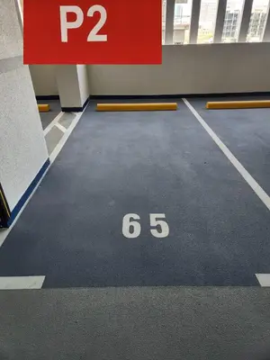 a parking lot with a number on the floor at 21 Studio in Skyz by Danube, Arjan in Dubai