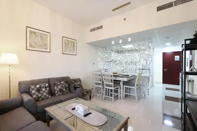 a living room with a couch and a table at Prime Located 3B with full Marina Views, Near Beach & Marina Mall in Dubai