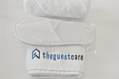 a white sock with theyssride written on it at Luxury 1BR Beach Access Creek Beach in Dubai