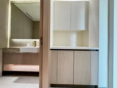 a bathroom with a sink and a mirror at Brand New 1BDR with Large Terrace 4 Guests in Dubai