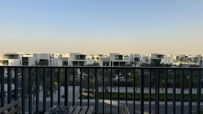 a view of a city from a balcony at Serene 1BDR in Dubai Hills with Balcony in Dubai
