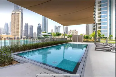 a swimming pool on the roof of a building at Luxurious Burj Vista Apartment with Burj Khalifa view in Downtown Dubai in Dubai